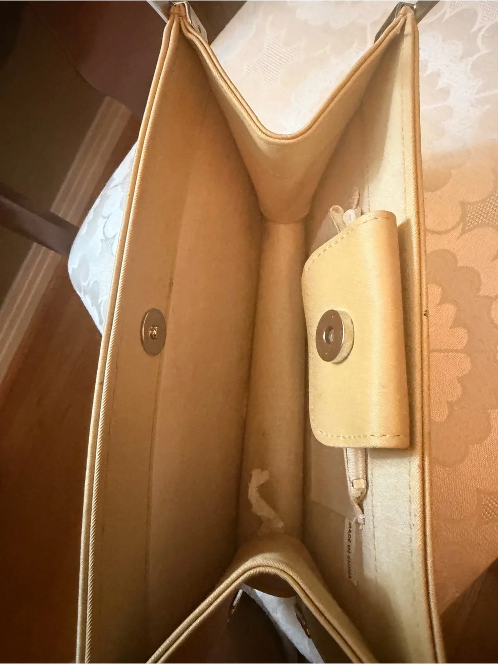 Cream Top-Handle Clutch with Metal Frame